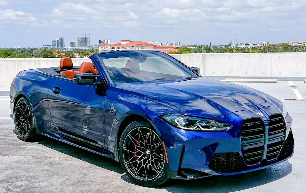 BMW M4 Competition Cabrio with its roof open